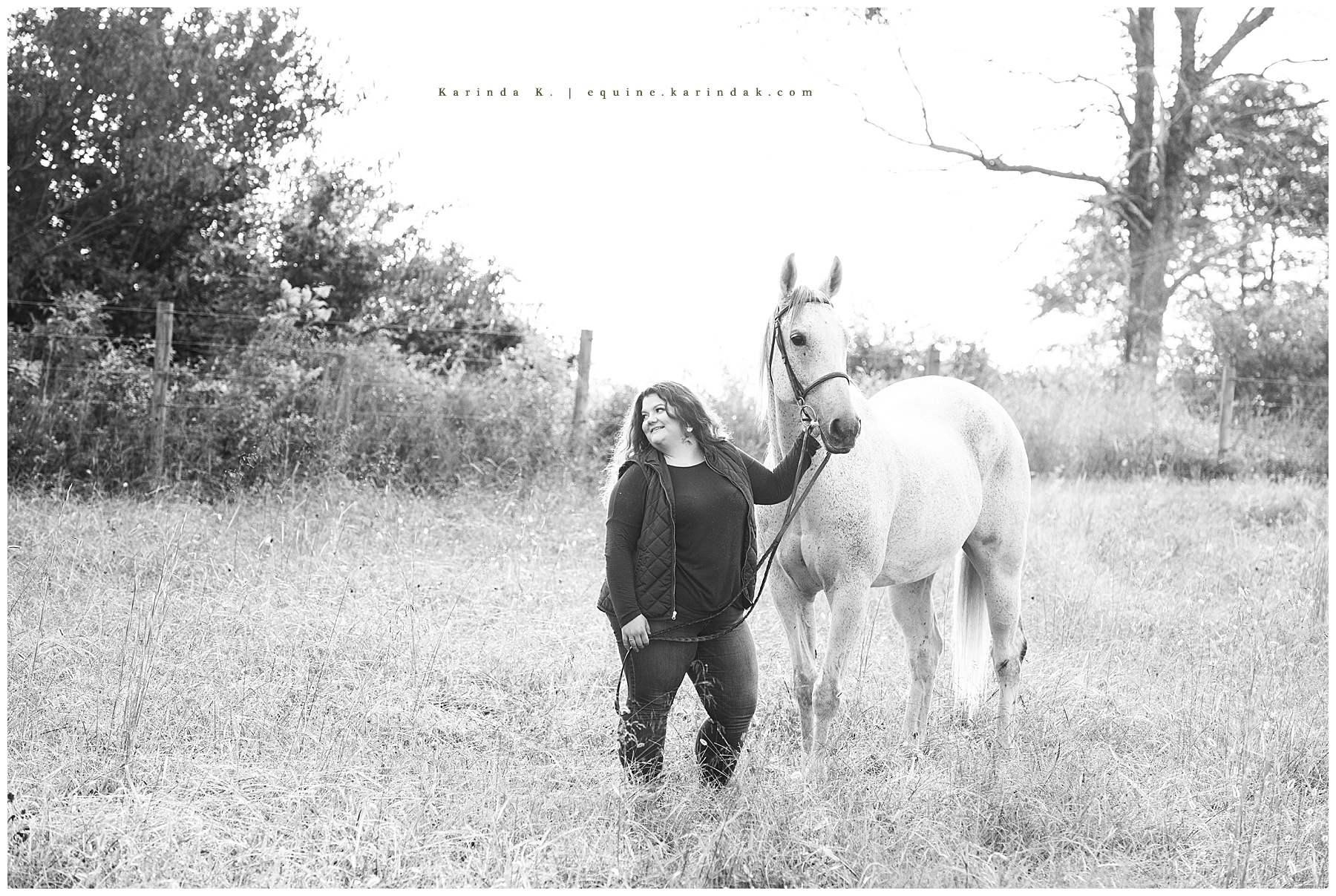 black and white horse and rider outdoor portrait